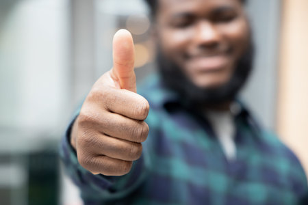 Happy African black man thinking, planning, finding good idea