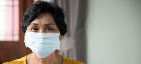 old senior woman wearing face mask, concept of mouth and nose covering face mask wearing, fine dust...