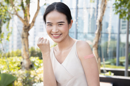 Healthy and strong asian woman getting inoculated or vaccinated immunity by vaccine program, concept...