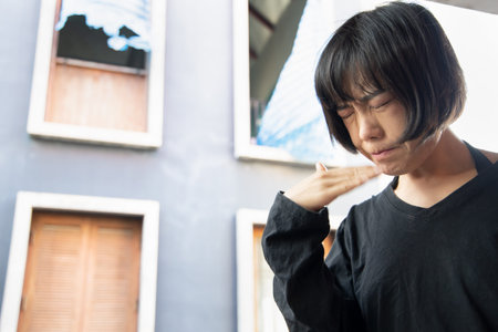 asian woman covering her nose for bad smell, concept of stink construction paint, bad breath,...