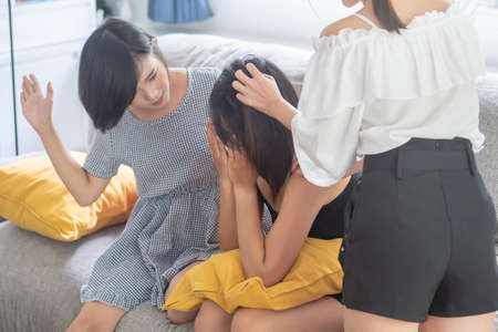 woman being abused or bullied, concept of verbal or physical violence, hate speech, personal shamingの写真素材