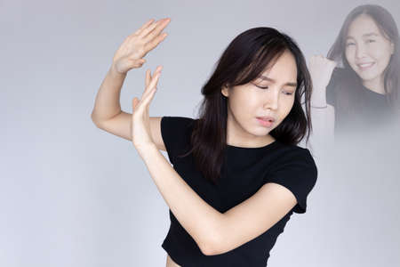 Poker face girl meme, happy woman pretending to be unhappyの写真素材