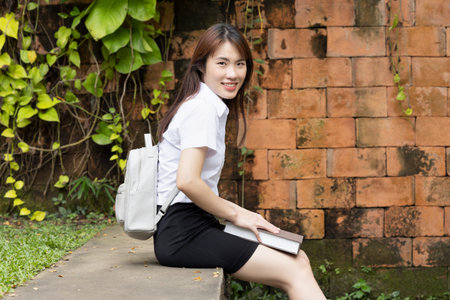 Happy smiling asian woman college student studying in university, concept of scholarship, student...