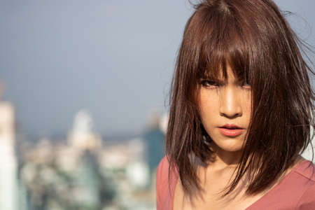 angry and upset asian womanの写真素材