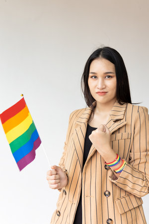 Strong non-binary LGBT person showing confident and empowering expression for LGBT awareness pride monthの写真素材