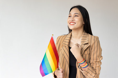 Strong non-binary LGBT person showing confident and empowering expression for LGBT awareness pride monthの写真素材