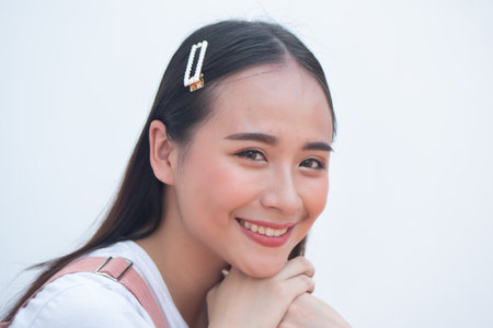 Happy smiling young asian womanの写真素材