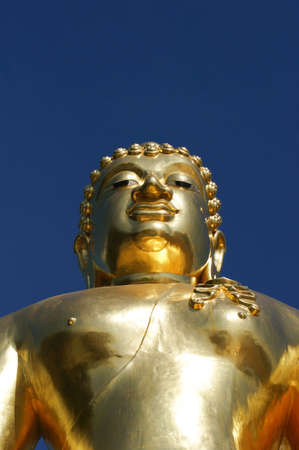 Buddha in the attitude of subduing Mara manner located at golden triangle の写真素材