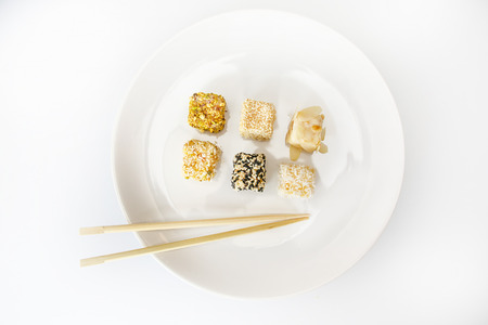 Daifuku Mochi Japanese desert, rice puding on a plate with chopsticksの写真素材