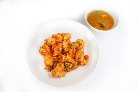 top view of chiken with soup on white wood tableの写真素材