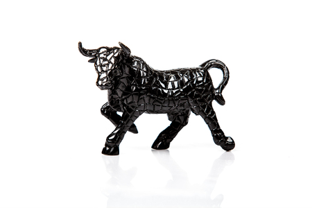 bull isolated on white background \ ceramic figureの写真素材