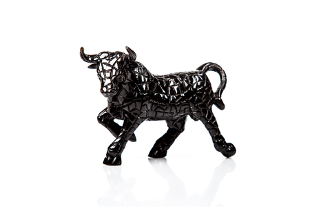 bull isolated on white background \ ceramic figureの写真素材