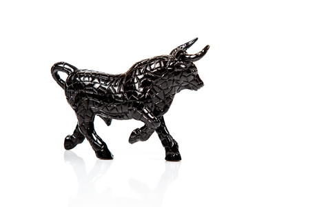 bull isolated on white background \ ceramic figureの写真素材