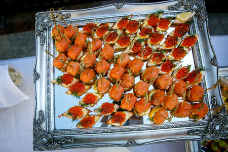 Catering service. Restaurant table with food at event partyの写真素材