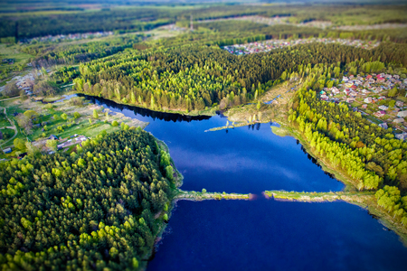 Torn dam among the coasts of the lake, view from the droneの写真素材