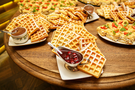 Viennese waffles with jam and chocolate on event cateringの写真素材