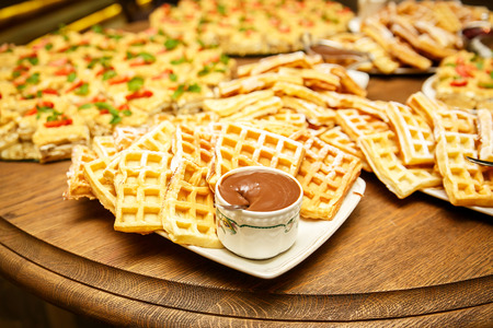Viennese waffles with jam and chocolate on event cateringの写真素材