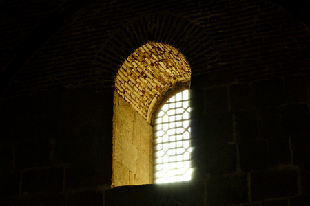 window with lattice in the castle, backlightの写真素材