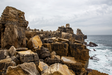 Cliff Rocks, Foggy Landscape of Portugal. Vintage Wallpaper, Rocky ocean shoreの写真素材