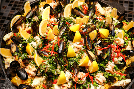 Traditional Spanish paella with seafood and chicken. Top view.の写真素材
