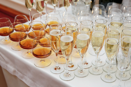 Buffet with lots of glasses on event cateringの写真素材