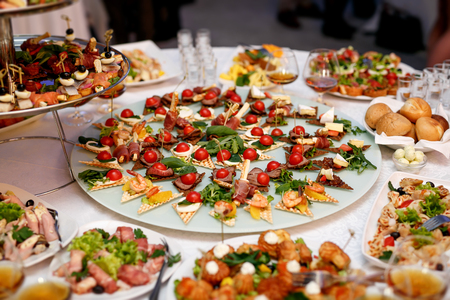 A lot of food and snacks on event cateringの写真素材
