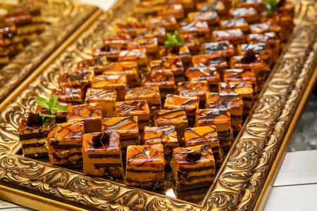 Sliced pieces of cake at event cateringの写真素材