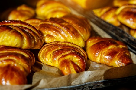 Croissants simple in bakery for breakfast, for saleの写真素材