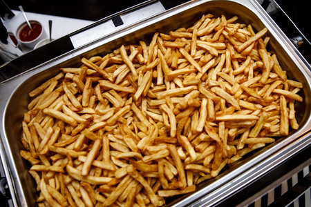 Close up of hot french fries.
