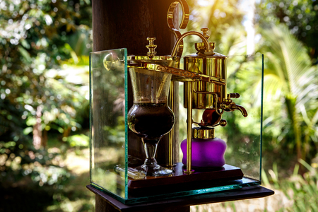 Making legendary coffee, Kopi Luwak, in a vintage siphon. Bali, Indonesiaの写真素材