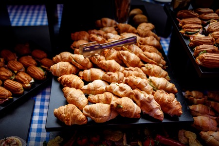 A lot of croissants on event catering.の写真素材