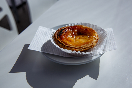 Portuguese dessert pastel de nata on a plateの写真素材