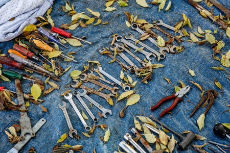 Different work tools at the autumnの写真素材