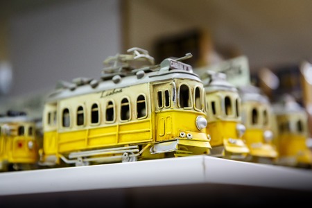 Symbol of Lisbon, a toy of the traditional yellow tramの写真素材