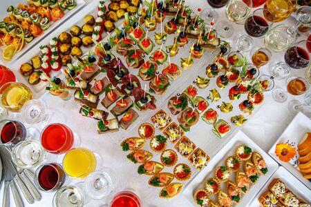 Snack table ready for event. Food and drink catering. Top viewの写真素材