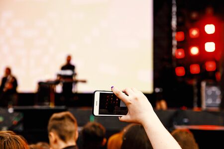 Shooting on a mobile phone, Concert showの写真素材