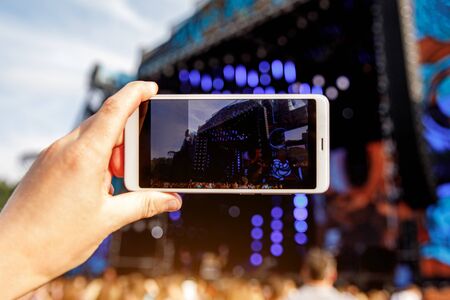 Shooting on a mobile phone, Concert showの写真素材