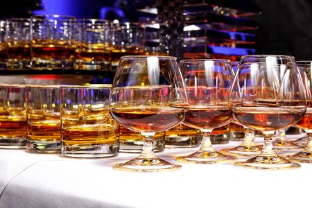Elegant glasses with alcohol at the partyの写真素材