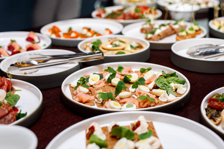 Different snacks and appetizers ready for a cocktail party. Catering concept.の写真素材