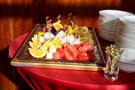 Fruits on a plate at the event. Sunlightの写真素材
