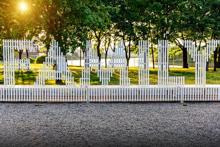 The word family cut out of wooden letters, sunset lightの写真素材