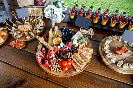 Summer party snacks on wooden table