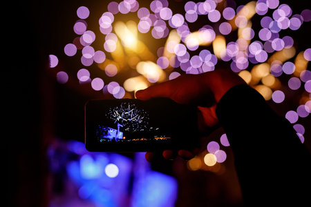 Smartphone shoots fireworks at a festive event.