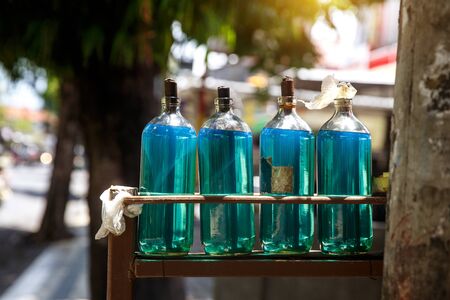 Bottles of gasoline petrol on Bali streetの写真素材