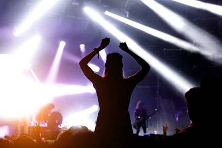 Silhouette of crowd concert, music fans on showの写真素材