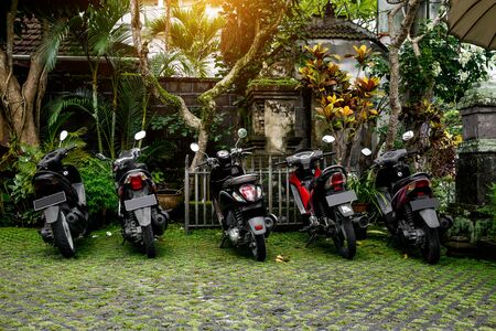 Motorcycles group parking on city street during adventure journey. Motorcyclists community travel concept.の写真素材