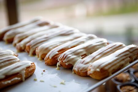 White Chocolate Poured Eclairs on cateringの写真素材