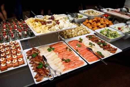Different types of fish on the banquet tableの写真素材