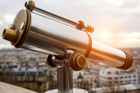 Telescope over the famous city in a wonderful placeの写真素材