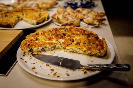 Sliced pie stuffed with meat and chickenの写真素材